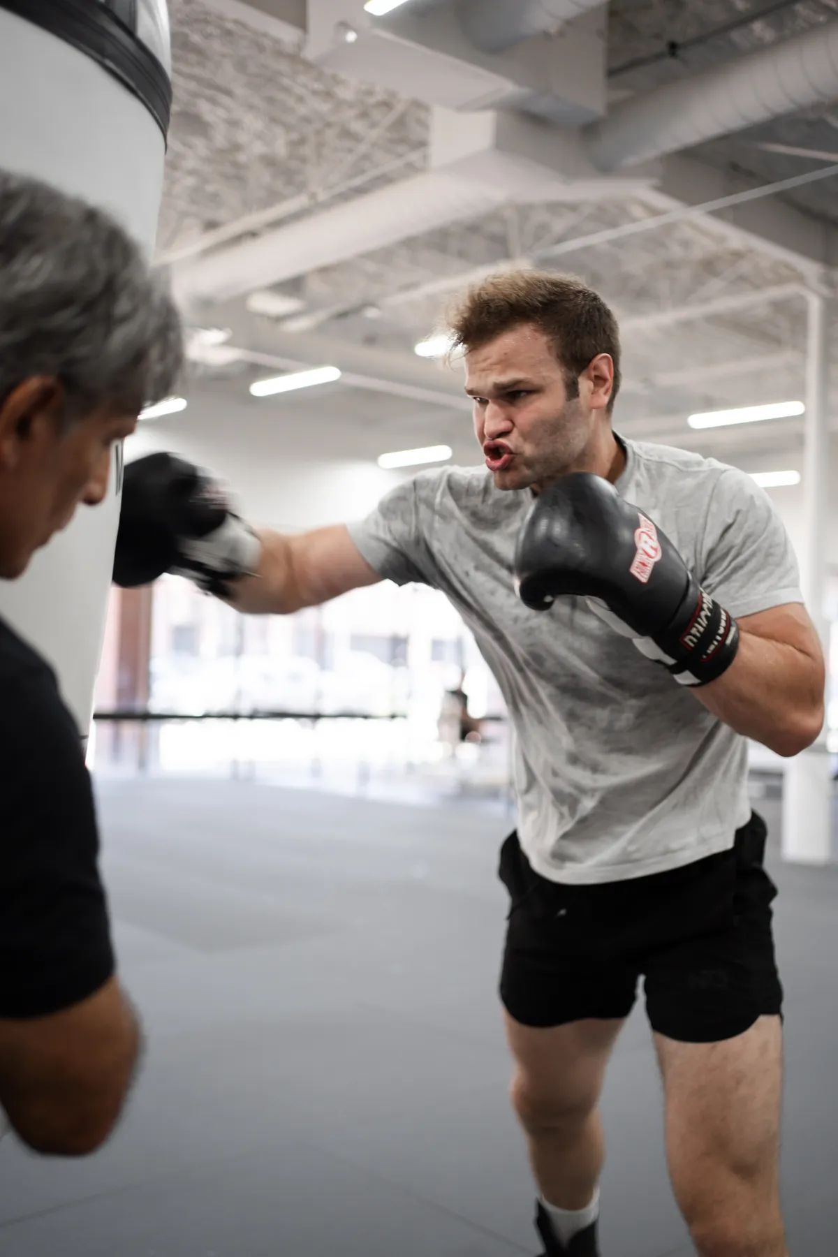 Boxing pad coaching at Hidden Gym North Dallas, July 2026